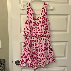 Pink cheetah print romper with pockets